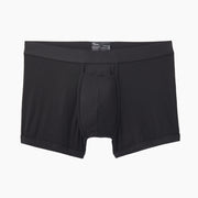 Black boxer brief layflat on grey background.