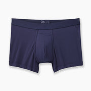 Navy boxer brief layflat on grey background.