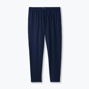 Pair of navy lounge pants sitting against light grey background. 