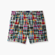 Pair of Madras printed lounge shorts laid flat on light grey background.