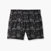 "Schooner" mesh lounge shorts that are black with white illustrations of boats laid flat on light grey background.