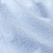 Close up detail shot of light blue slim fit boxer material.